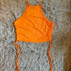 Orange side-tie cropped top